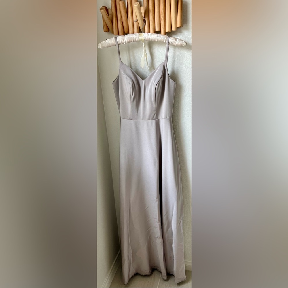 Silver/ gray bridesmaid dress. Only worn once and purchase brand new.